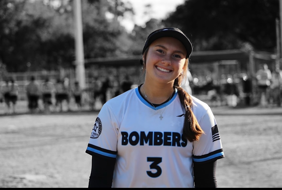 Kaylee Covanes in her Bombers uniform in a black-and-white action shot